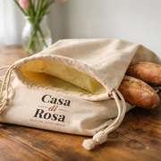 Sacchetto Casa di Rosa aperto con pane rustico